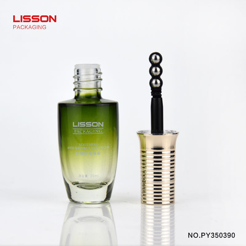 Eye cream bottle with vibration applicator