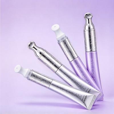 Cosmetic squeeze tube with massager